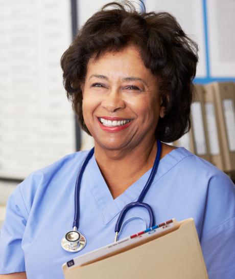 Older nurse with file