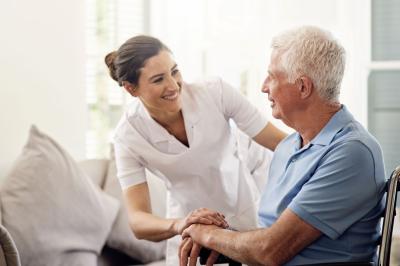 nurse-caring-for-older-male-patient