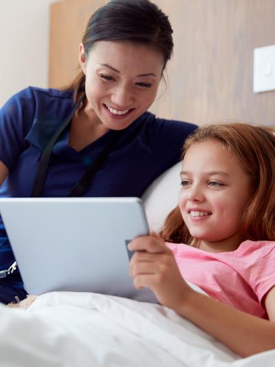 Nurse with pediatric patient